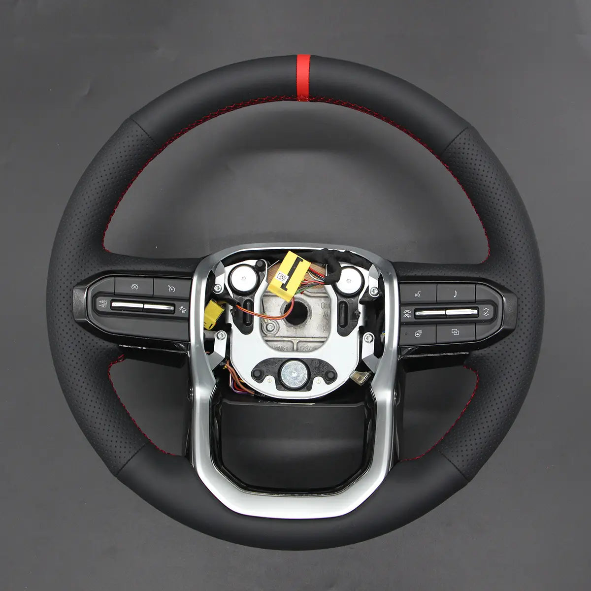 ArcYaY rugged steering wheel cover for the GMC Sierra EV electric truck (23-25). Protects the wheel, enhances grip for work or daily use.