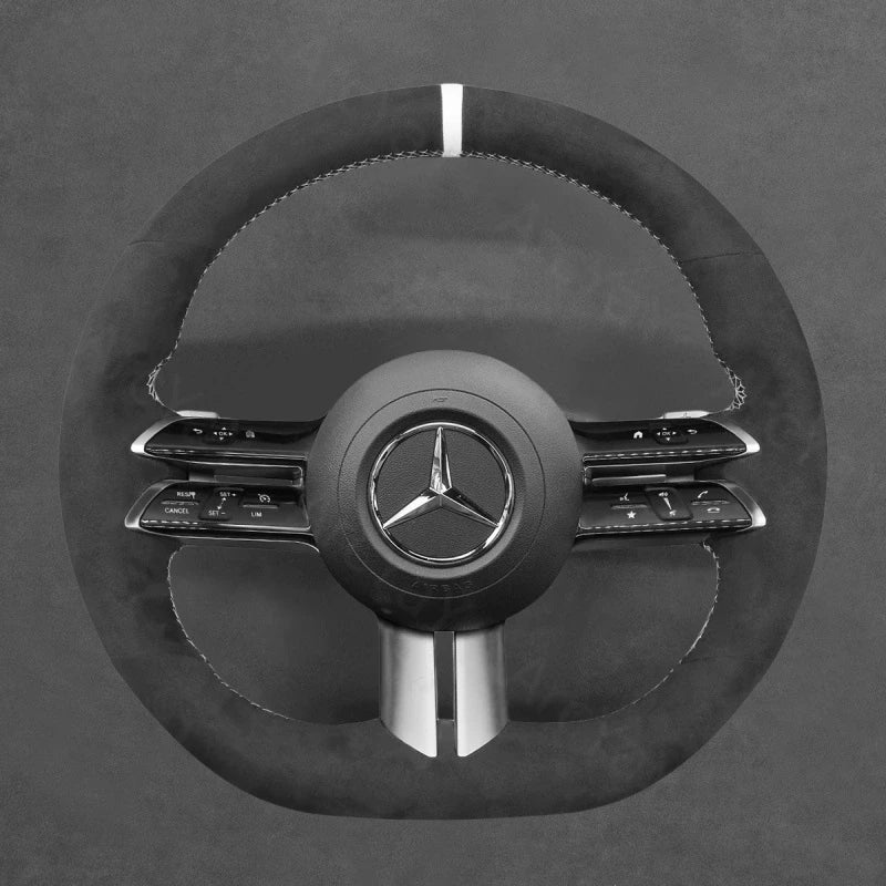 ArcYaY provides a custom, hand-stitched, Sport-Optimized Steering Wheel Cover for Mercedes AMG-Line & AMG-Sport models (2021–2022). Unleash superior style.
