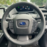 ArcYaY steering cover for the Subaru Solterra electric SUV (22-25). Offers protection against wear, enhances grip, and adds comfort.
