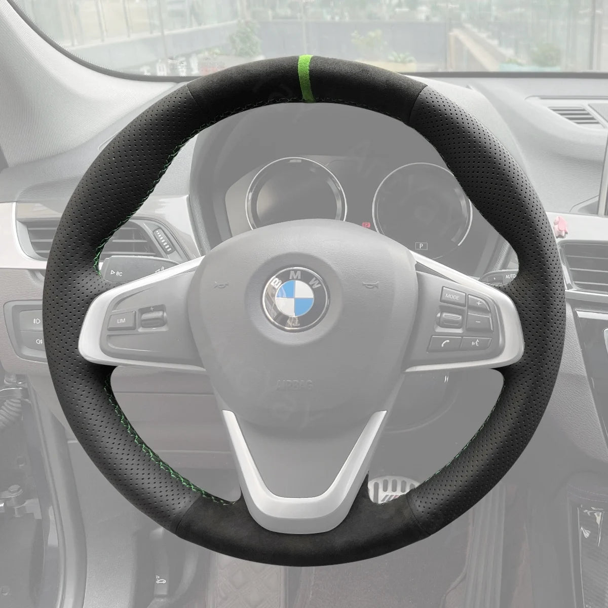 Custom-fit steering wheel cover for BMW X1 F48 and X2 F39 (2015-2022). Elevates grip, comfort, and sporty appearance.
