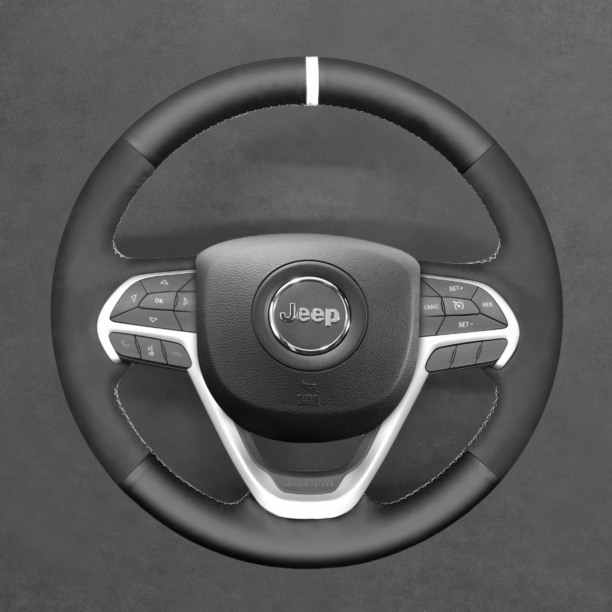 Upgrade your Jeep Grand Cherokee V (2014-2023) steering wheel with ArcYaY's cover. Premium PU leather, ergonomic stitching, and non-slip design ensure lasting comfort, enhanced grip, and rugged, refined style.