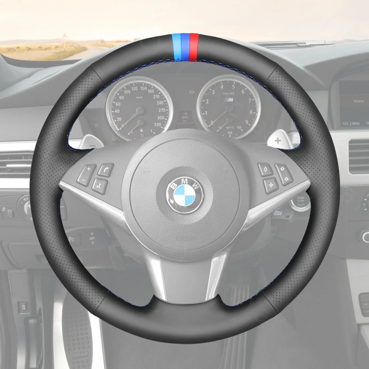 Premium steering wheel cover for BMW 5 Series E60 (2003-2009). Enhances grip and adds comfort for a better driving experience.