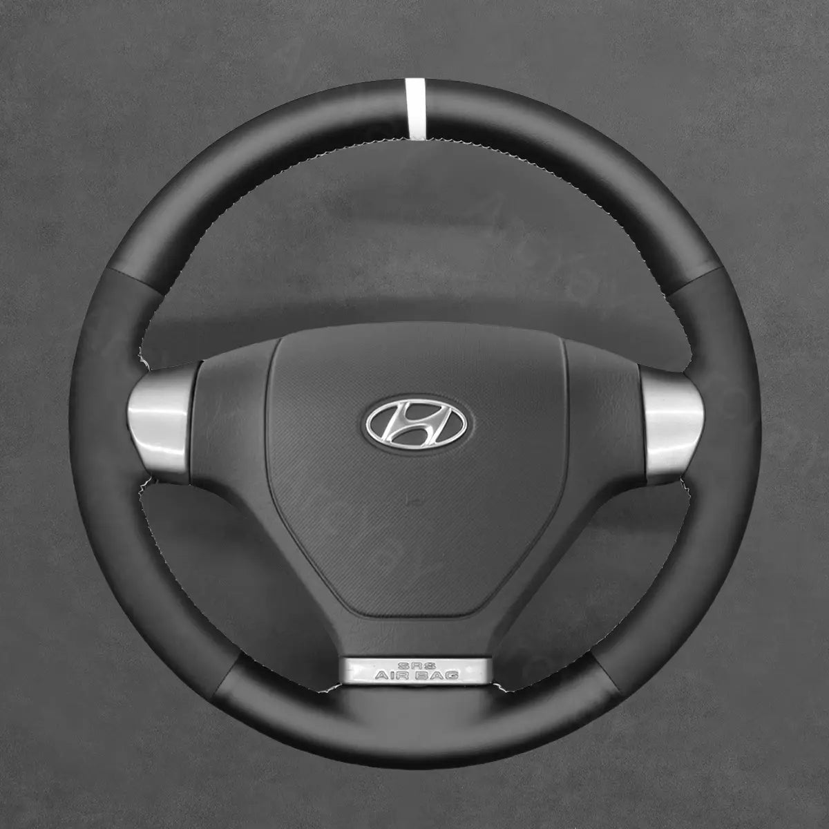 Upgrade your Hyundai S-Coupe 2007-2010 with this sporty steering wrap, designed to enhance grip and refresh your coupe's cabin.