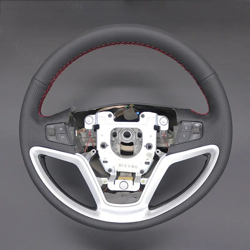 Upgrade your Opel Antara 2006-2018 with the ArcYaY custom hand-sewn steering wheel cover. Designed to fit perfectly, this cover offers improved comfort, superior grip, and long-lasting durability, adding both functionality and style to your vehicle's interior.
