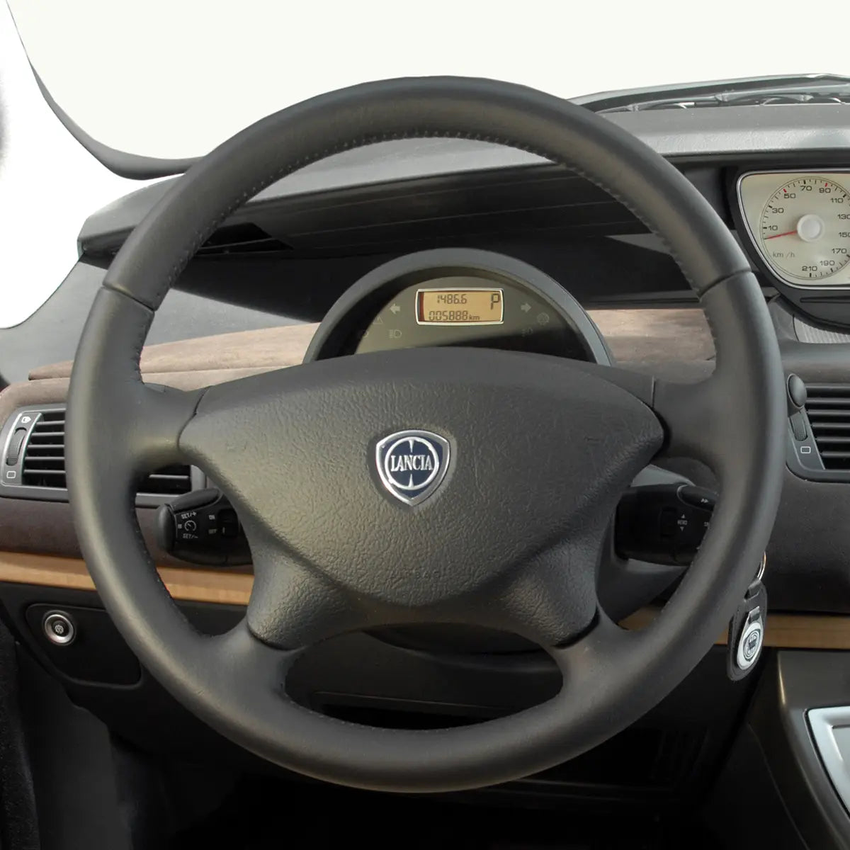 Custom-fit ArcYaY steering wheel cover for Phedra 2003-2011. Hand-stitched luxury grip, OEM-fit upgrade-boosts comfort & style. Fast shipping-order today!